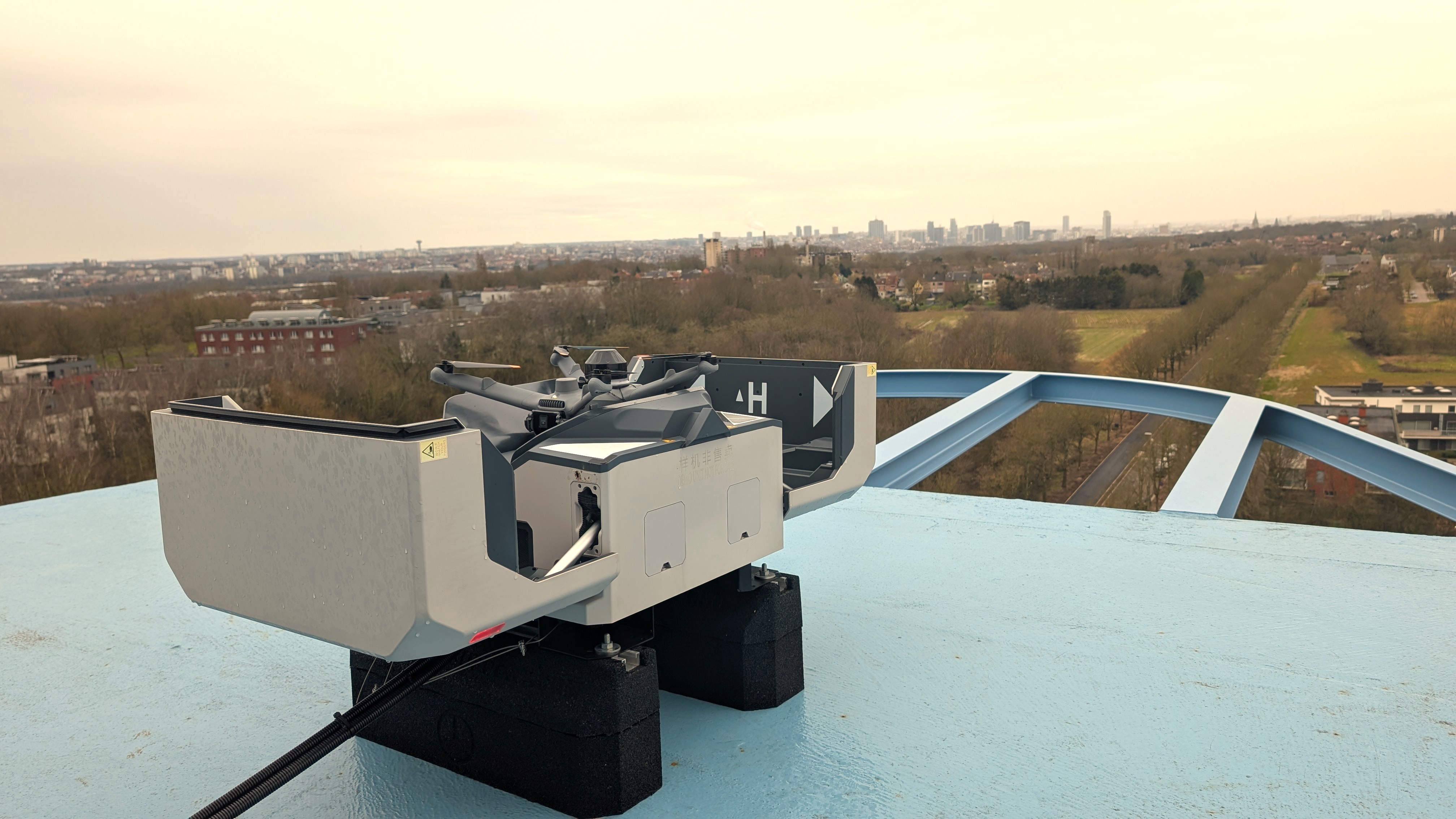 First Drone Flight with Active Deconfliction in Controlled Airspace around Brussels Airport